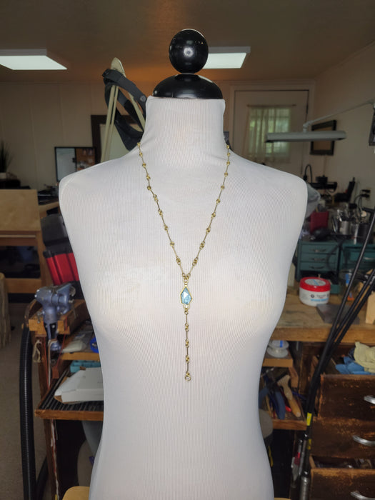 Faceted freeform aquamarine and diamond necklace with handcrafted 18k gold chain