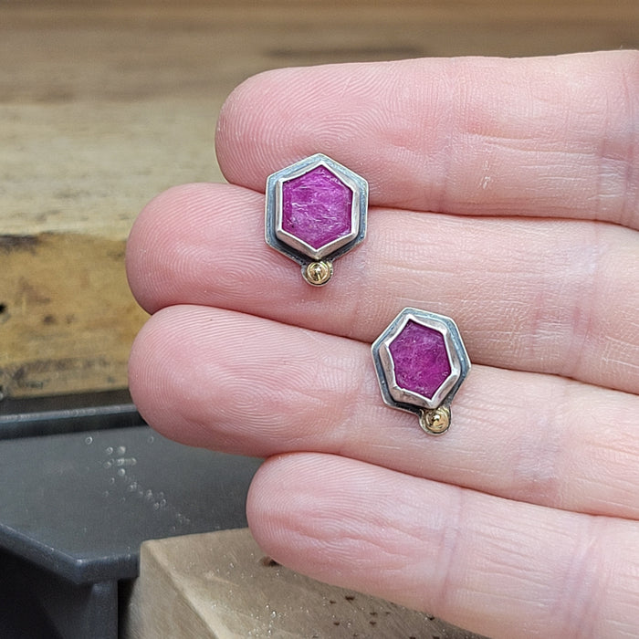 Hexagonal ruby mismatched post earrings in sterling with 14k gold